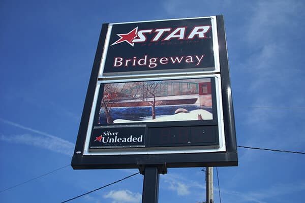Convenience Stores Star Bridgeway Pole Sign