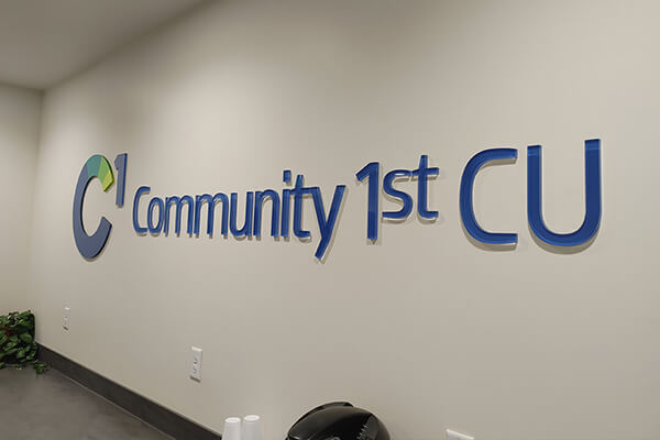 Community 1st CU Interior Dimensional Logo